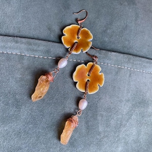 Rose gold tone dangle earrings with flower shaped ocher buttons, long dangle with pearls and raw citrine drops, statement boho earrings