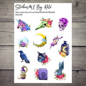 May include: A sheet of stickers featuring a variety of whimsical and spooky designs, including a unicorn, a skull, a cat, a raven, a crescent moon, a potion bottle, a crystal ball, a hand with a snake, a book with a pentagram, and a rabbit. The stickers are perfect for adding a touch of magic to your planner, journal, or laptop.