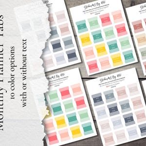 May include: A selection of pastel-coloured planner stickers on white paper. Each sticker is a rectangular shape with rounded corners, resembling a thread spool. The text "Monthly Planner Tabs" is visible.