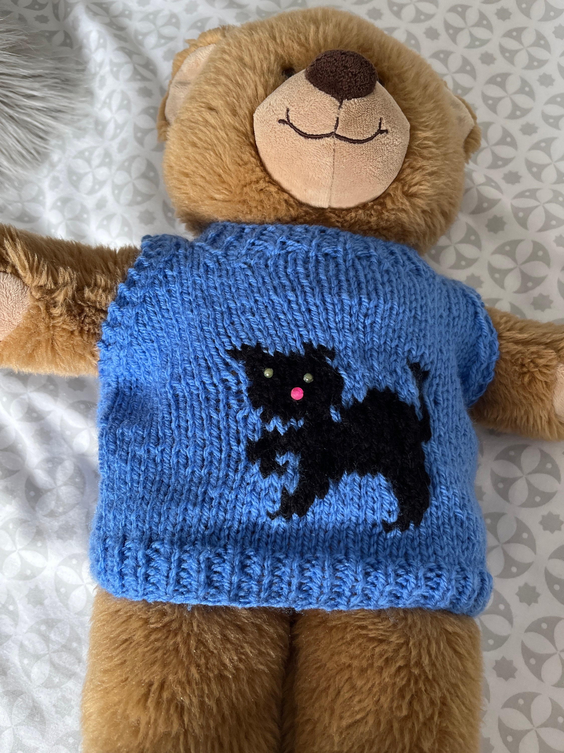 Black teddy bear sweater hotsell