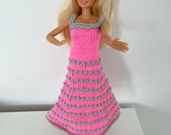 Hand knitted barbie doll clothes. Pink and silver grey striped flared dress