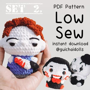May include: A collection of handmade crochet dolls, including a figure with orange hair, a white face, and a blue outfit, holding a red and black object. The image also features a vampire doll and a panda doll. Text on the image reads "PDF Pattern Low Sew".