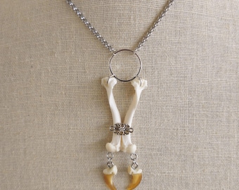 Mink bone Necklace with coyote claws. Bone statement necklace.