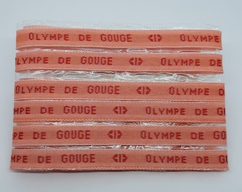 Lot of sewing labels • orange background red text • personalized woven first name • message bracelet • wedding guest gift