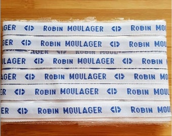 Lot of sewing labels • white background blue text • personalized woven first name • message bracelet • wedding guest gift