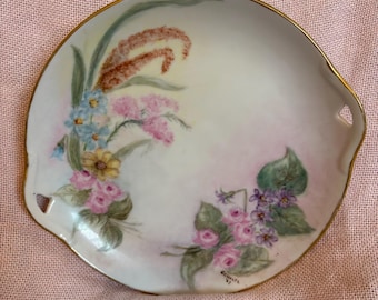 Vintage  hand painted porcelain dish 7 inches