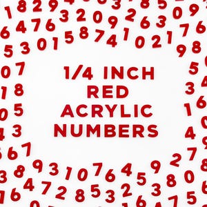 May include: Red acrylic numbers, each 1/4 inch in size, scattered on a white background. The text "1/4 INCH RED ACRYLIC NUMBERS" is centered in the image. Ideal for crafts and educational projects.