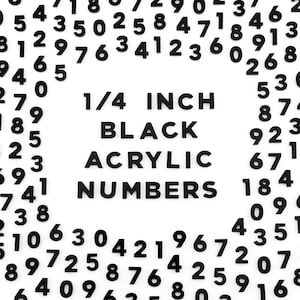 May include: Black acrylic numbers, 1/4 inch in size, scattered on a white background. The image features the text "1/4 INCH BLACK ACRYLIC NUMBERS". These numbers are ideal for crafts and DIY projects.
