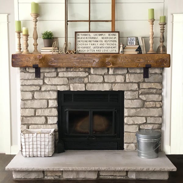 Rustic Fireplace Mantel with Metal Brackets: Handcrafted Wood Beam