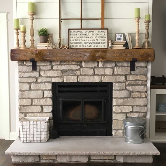 Wood and metal accent combination on mantle