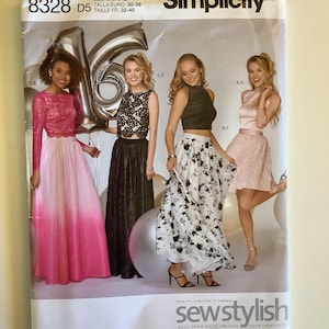 May include: Simplicity sewing pattern 8328 D5 featuring four models in formal dresses. The pattern includes sizes U.S. 4-12. The cover shows a pink ombre gown, a black lace top and skirt, a floral skirt, and a pink satin dress.