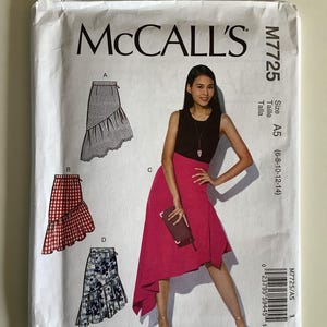 May include: McCall's M7725 sewing pattern envelope. The front features illustrations of skirt designs, including a ruffled skirt in red gingham, a floral print skirt, and a solid pink skirt. The model is wearing a pink skirt and black top.