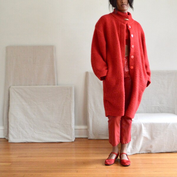 red wool ribbed cocoon sweater coat with funnel neck