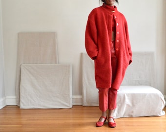 red wool ribbed cocoon sweater coat with funnel neck