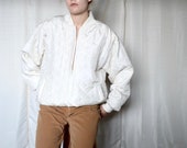 white silk quilted bomber jacket