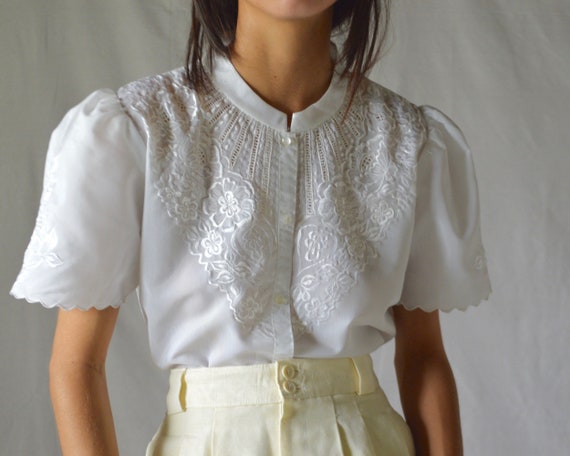 white puff sleeve cut out embroidered button blous