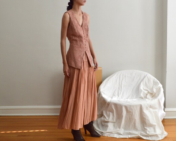 crochet vest and pleated skirt set