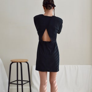 structured cut out back black mini strong shoulder dress image 6