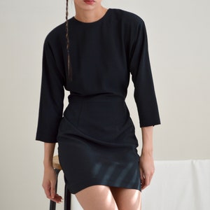 structured cut out back black mini strong shoulder dress image 2