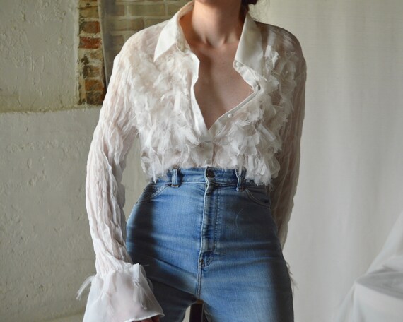 white crinkle pleat blouse with raw edge ruffle