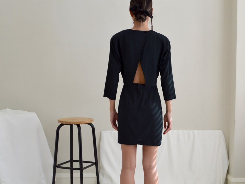 structured cut out back black mini strong shoulder dress image 4