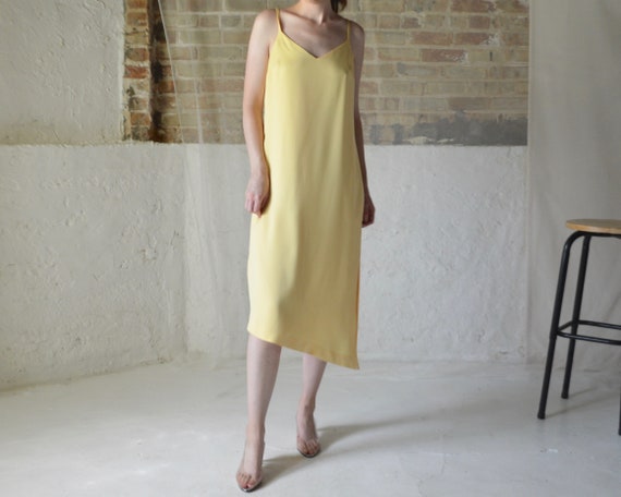 pale yellow sateen asymmetrical slip dress with ti