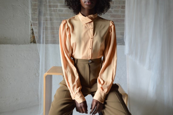 pale orange puff sleeve blouse / medium