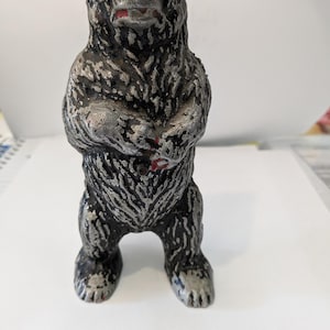 Original antique black bear coin bank