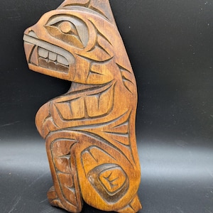 West coast Salish first Nations indigenous carved bear signed by Eli j in Cedarwood