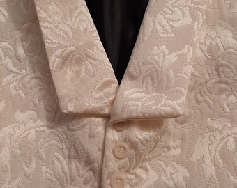 Tuxedo Vest at it's finest with variations for styling. Shown in ivory brocade with self lapels.