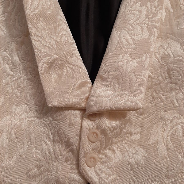 Tuxedo Vest at it's finest with variations for styling. Shown in ivory brocade with self lapels.