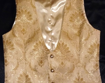 Tuxedo style fully lined vest with three buttons and full-cut adjustable back