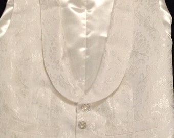 Full, tailored, mock shawl collared vest shown here in finest off-white satin damask brocade