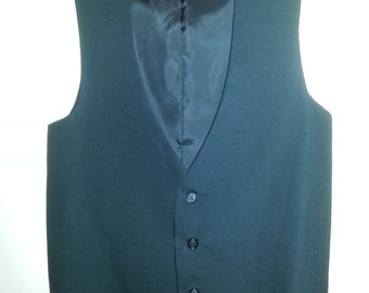 Tuxedo style fully lined vest with three buttons and full-cut adjustable back