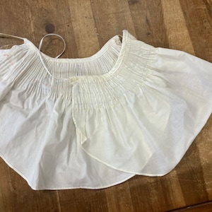 two Ready to  smock baby bibs, WHITE ribbon ties
