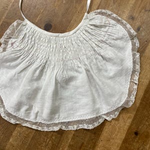 Hemstitched lace on Ready to  smock baby bib, white linen