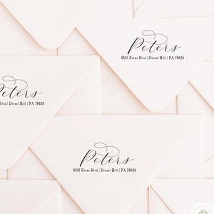 May include: Close-up of several cream-colored envelopes, each with the name "Peters" in elegant script and the address "8501 Ferne Blvd | Drexel Hill | PA 19026" printed in black. The envelopes are arranged in a layered pattern.