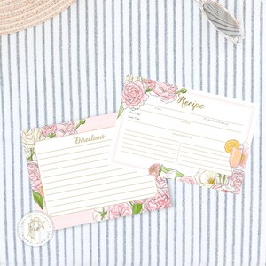 May include: Two printable recipe cards with floral designs. The top card has a pink floral design and the text "Recipe" in gold. The bottom card has a pink and white floral design and the text "Directions" in gold.