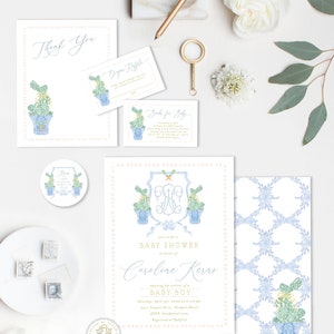 May include: A baby shower invitation with a blue and white floral design. The invitation features a monogram with the initials "CK" and the text "Join us for a Baby Shower in honor of Caroline Kerrs, celebrating the arrival of a Baby Boy. Saturday, April 30, 2022 at 2:00 pm, 3511 Canyon Drive, Newport Beach. RSVP: host@email.com. Registered at Babylist."