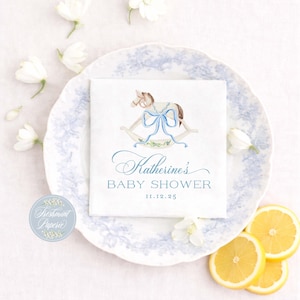 May include: A white ceramic mug with a black handle and the text "But First, Coffee" in a black, bold font. The mug is sitting on a wooden surface. The mug is 4 inches tall.