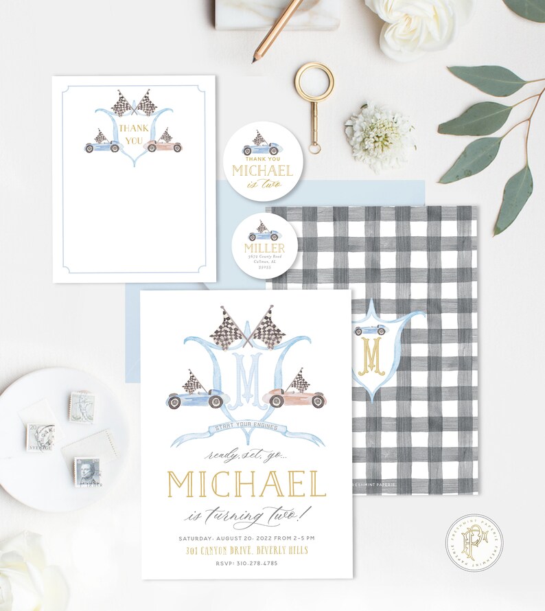 May include: A blue and white checkered background with a white invitation card. The invitation card has a watercolor illustration of two race cars with checkered flags and the text "ready, set, go... MICHAEL is turning two!"  The invitation includes the date, time, and location of the party.