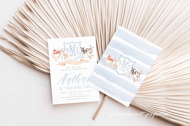May include: A blue and white watercolor invitation with a farm animal theme. The invitation says "Dine, baa, moo! Join us for a barnyard bash. Nathan is turning one. Sunday, June 13th, 2021 at 2:00 PM. Mitchell Farm. 321 Cannon Drive, Beverly Hills. RSVP: [email protected]"