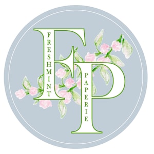May include: A light blue circle with a white "F" and "P" in the center. The "F" has the word "Freshmint" written vertically down the side. The "P" has the word "Paperie" written vertically down the side. The letters are surrounded by green leaves and pink flowers.