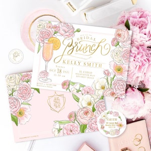 May include: A pink and white floral bridal brunch invitation with gold lettering. The invitation features a mimosa, the text "Bridal Brunch", and the name "Kelly Smith". The invitation also includes the date, time, and location of the event.