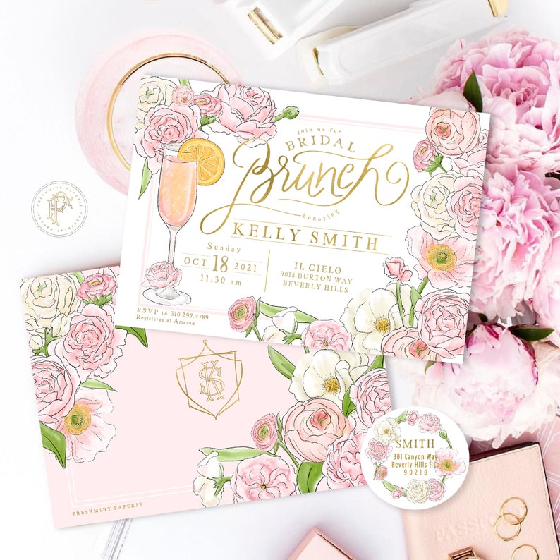 May include: A pink and white floral bridal brunch invitation with gold lettering. The invitation features a mimosa, the text "Bridal Brunch", and the name "Kelly Smith". The invitation also includes the date, time, and location of the event.