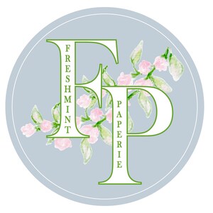 May include: A light blue circle with a white "F" and "P" in the center. The "F" has the word "Freshmint" written vertically down the left side. The "P" has the word "Paperie" written vertically down the right side. The letters are surrounded by green leaves and pink flowers.