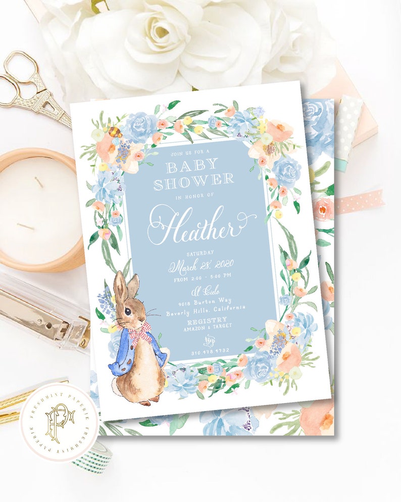 May include: A blue and white baby shower invitation with a floral border and a cartoon rabbit. The invitation says "Join us for a Baby Shower in honour of Heather" and includes the date, time, location, and registry information.