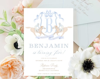 May include: A blue and white invitation with a crest featuring a horse and jockey. The invitation is for a birthday party for Benjamin, who is turning five. The party will be held on Saturday, May 28, 2022 at 2:00 PM at 308 Canon Drive, Beverly Hills, California. RSVP to Natalie at 310.278.4795.