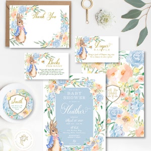 May include: A blue and white baby shower invitation featuring a watercolour illustration of a bunny rabbit wearing a blue jacket and a floral wreath. The invitation includes the text "Join me for a Baby Shower in honour of Heather" and the date "Saturday, March 28, 2020".