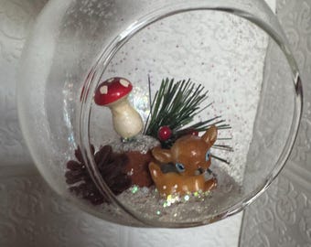 Blown glass diorama ornaments hand assembled with vintage accessories bottlebrush trees Santa Claus big eyed flocked deer nativity
